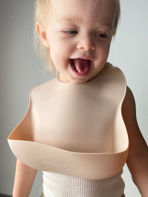 Willow wearing our silicone bib